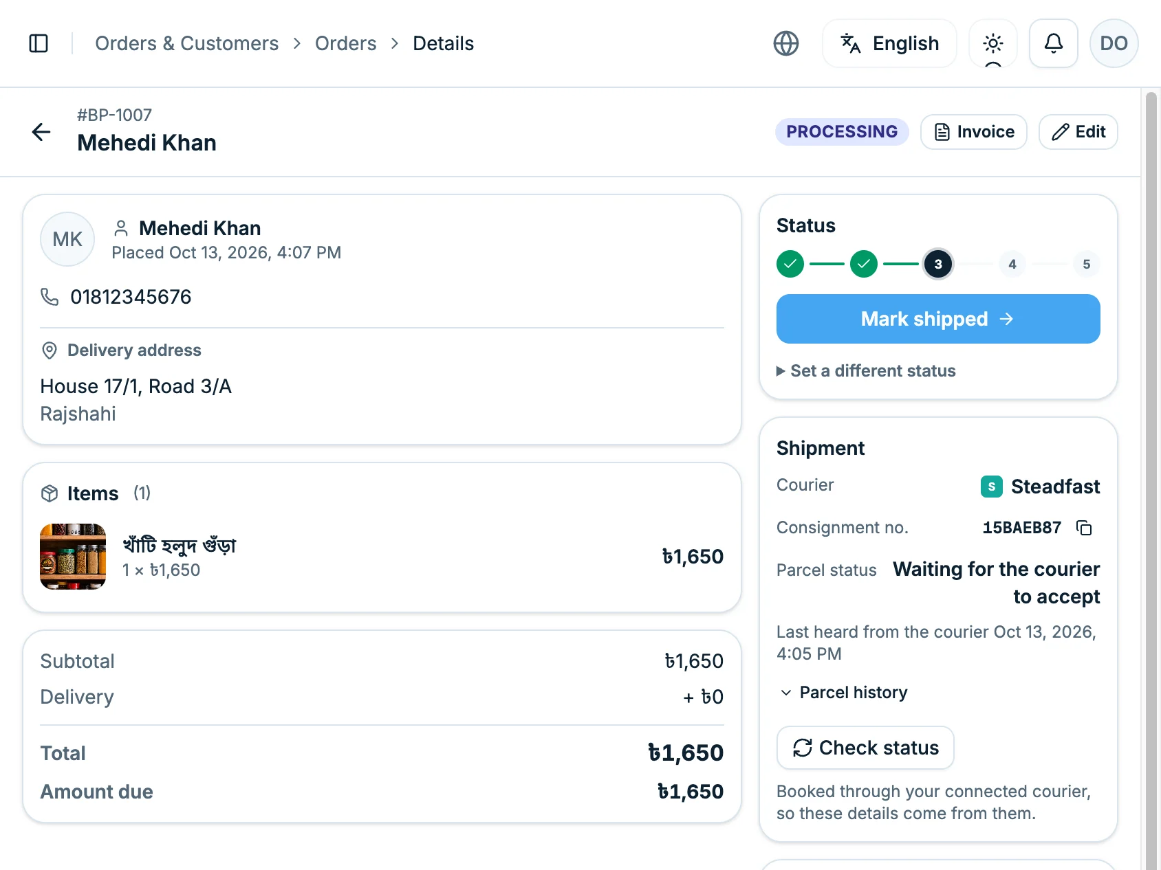 An order page just after booking, with the Shipment box on the right: courier, consignment number and status